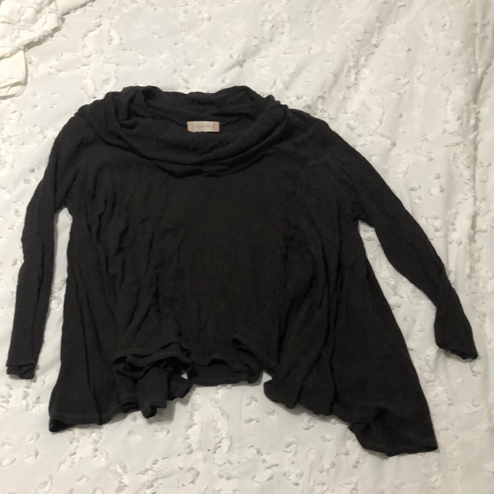 A brown long sleeved top